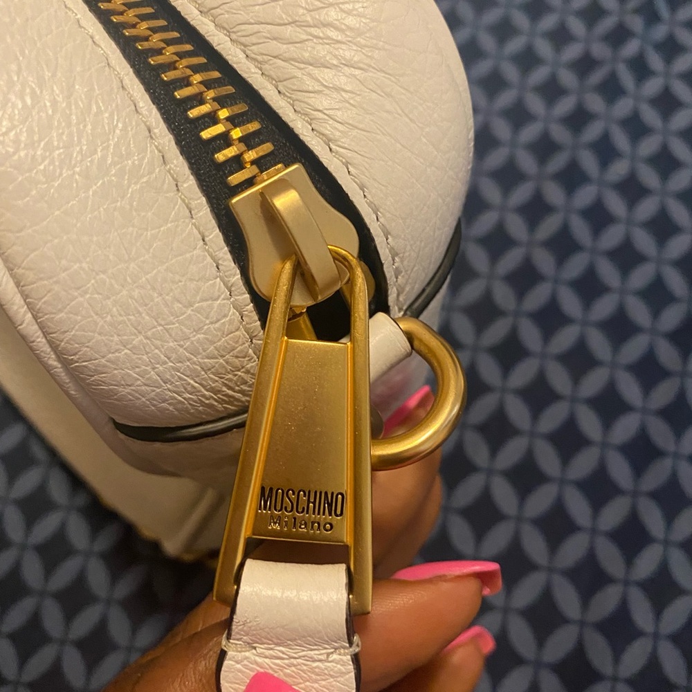 Authentic moschino purse with tag and dust bag .. perfect condition